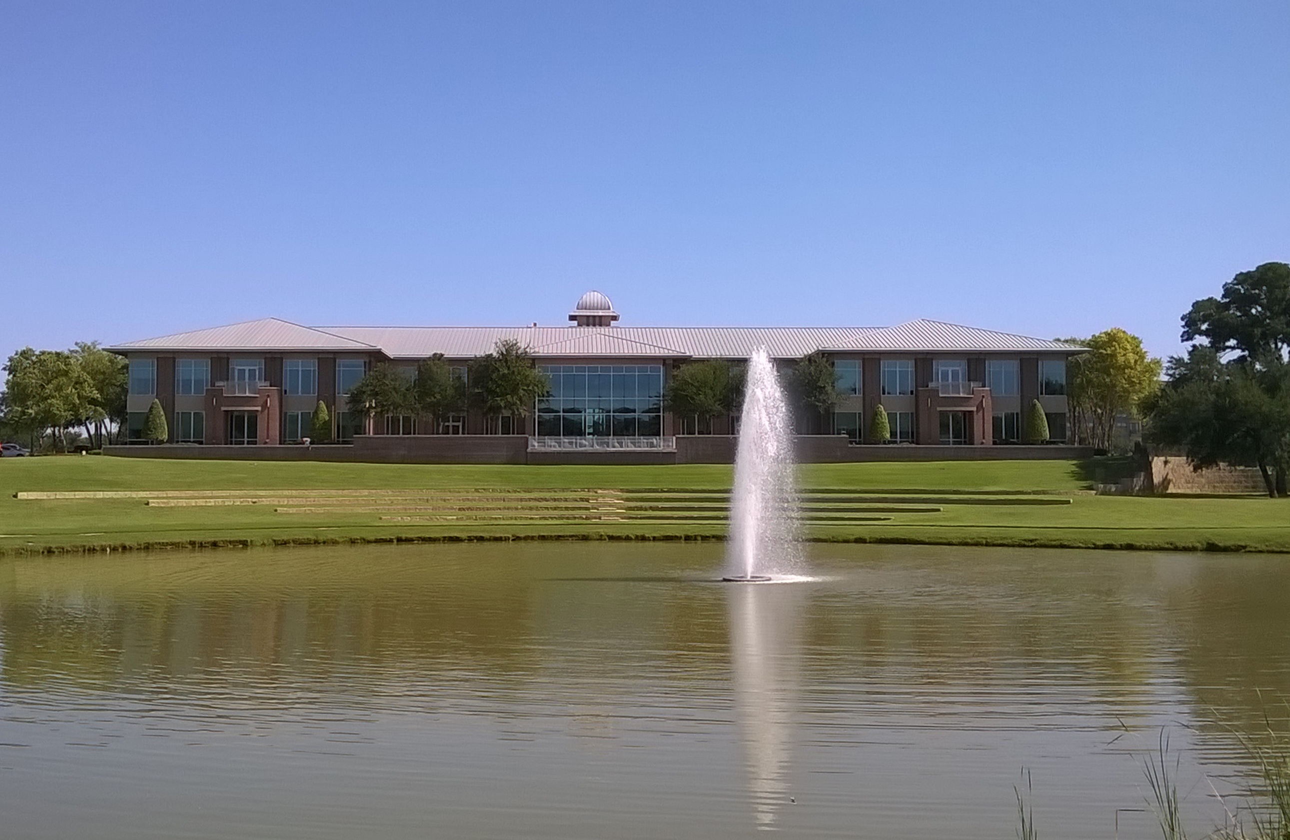 Keller City Hall beside its lake, photographed in July 2015