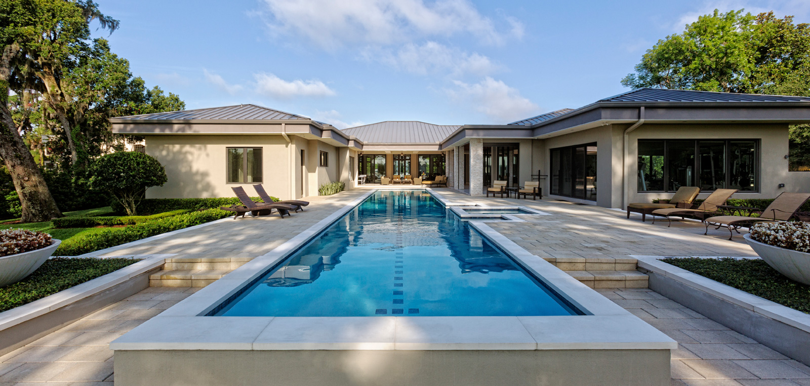 Pool and outdoor living inspiration from the brokerage’s existing website; not an identified listing